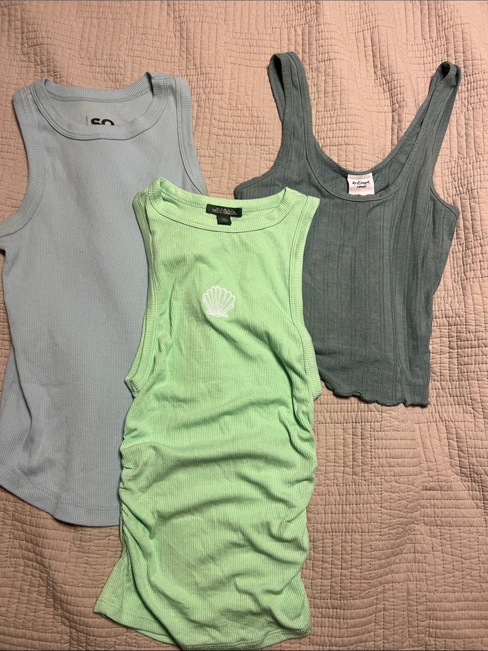 2 XS blue textured tanks and 1 XXS green shell cinched sides tank.